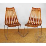 A pair of Hans Brattrud Scandia chairs, with teak slats and chrome frames, lacking labels, 95.