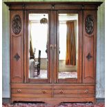 An Arts and Crafts oak dressing table,