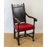 A late 17th century and later oak panel back chair, with upholsterd seat,