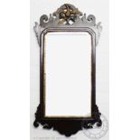 A 19th century gilt wood and gesso oval wall mirror, 88cm x 52cm,