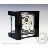 A modern Art Deco style Kieninger chiming mantel clock,