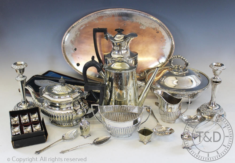 A selection of silver plated wares, to include; a bone handled warming dish,