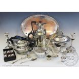A selection of silver plated wares, to include; a bone handled warming dish,