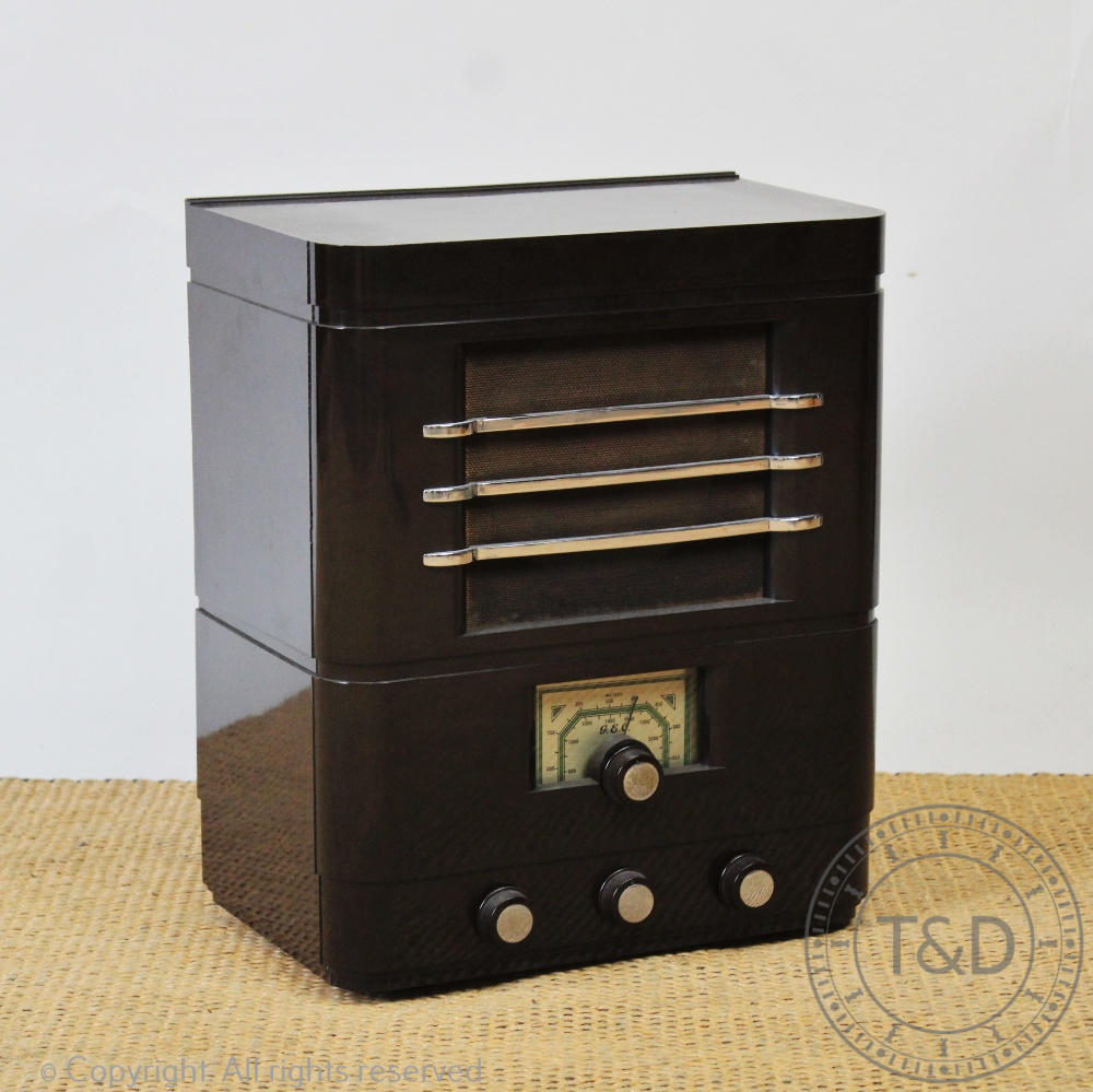 A General Electric Company Art Deco bakelite radio, withh chrome detailing,