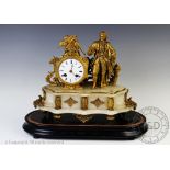 A 19th century gilt spelter and alabaster figural eight day mantel clock,
