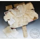 A collection of children garments and lace work, to include; an ivory coloured,