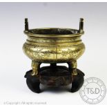 A Chinese polished bronze koro of archaic form, Xuande mark,