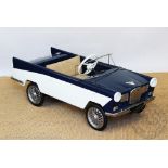 A Super Worseley pedal car, with suede interior and white and blue painted exterior ,