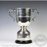 'The Arnold Hewitt Perpetual Challenge Cup', a large two handled George V silver trophy,