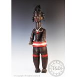 A large West African Nigerian carved and painted wood Ibibio tribe female figure,