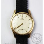 A 9ct yellow gold gentleman's wristwatch, circa 1965, the circular face enclosing baton,