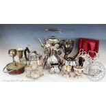 A selection of silver plated wares to include a case christening mug of coopered barrel form,
