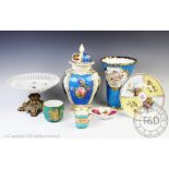 A collection of European porcelain, to include; a Meissen style flared vase, decorated with cherubs,