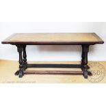 A mahogany railway station table, c1900, with leatherette inset top,