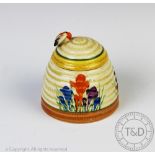 A Clarice Cliff crocus pattern honey pot and cover, the lid at fault,