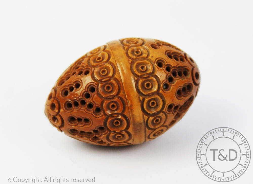 A 19th century carved coquilla nut, 6.