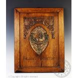 A Naval interest carved oak commemorative plaque believed to be made from Nelsons HMS Foudroyant,