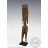 A West African carved wood tribal art Mobe figure from Togo, of weathered appearance,