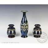 A pair of Doulton Lambeth stoneware vases dated 1876,