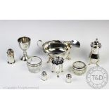 A collection of silver condiments and dining accessories, to include; a silver sauce boat,