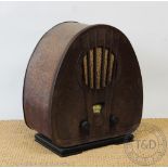 A Philips Art Deco radio, with faux walnut case,