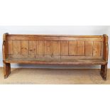A late Victorian pine pew,