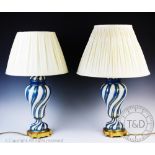 A pair of French porcelain lamp bases, 20th century, each of baluster,