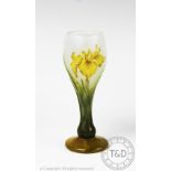 A Daum cameo glass liquor glass, decorated with yellow iris,