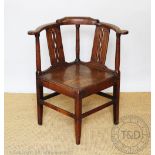 A George III Welsh oak corner chair, 82cm high Provenance: Clynog Farmhouse,