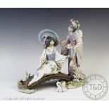 A Lladro Springtime in Japan figural group,