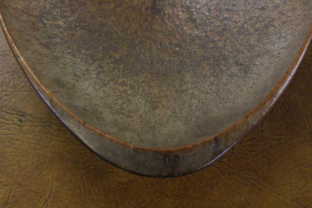 A 19th century vernacular treen sycamore oval settling bowl, 58cm wide Provenance: Clynog Farmhouse, - Image 7 of 8