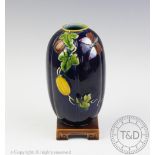 A 19th century Minton majolica vase, of oval melon form,