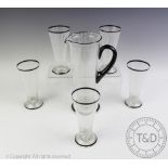 A 1950's glass lemonade set, comprising; five tall glasses, 16cm high and a large ewer,