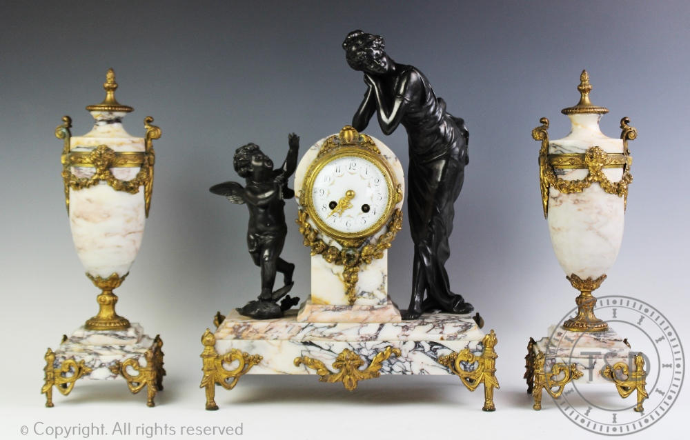 A French late 19th century marble clock garniture,