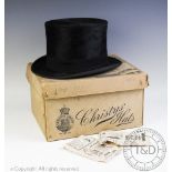A Christies of London top hat, in box, internal aperture 16.5cm x 20.
