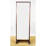 A mahogany cheval mirror, with rectangular plate,