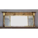 An early 19th century giltwood and gesso triple plate over mantle mirror,
