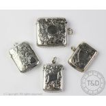 Three Edwardian silver vesta cases and a George V example, various makers,
