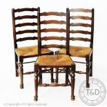 Four stained oak ladder back dining chairs,