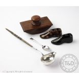 A toddy ladle, the bowl inset with a coin and attached twisted baleen handle,