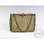 A 1950s 'diamante' encrusted ladies clutch bag, possibly French,