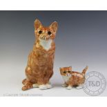 Two Winstanley ceramic cats, to include: a large ginger cat, modelled seated,