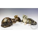 Three Winstanley ceramic cats, to include; a grey tabby, modelled prone, painted signature under,