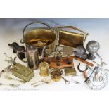 An assortment of brass and other metal wares to include: a brass jam pan, a kitchen scale,