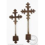 Two Ethiopian iron hand crosses, both with engraved detailing, 28.