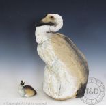 A modern stoneware model of a bird, possibly a dodo, initialled to the base 'GJH', height 40cm,