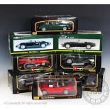 Eight boxed mainly 1:18 scale diecast vehicles, comprising; Maisto Jaguar Mark II,