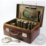 An early 20th century assembled silver travelling dressing case,