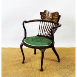 An Edwardian inlaid mahogany tub type chair, with oval seat, on cabriole legs, 82cm H,