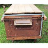 A vintage W H Smith of Whitchurch cheese vat, brass mounted with cast iron frame, wheels and tilt,